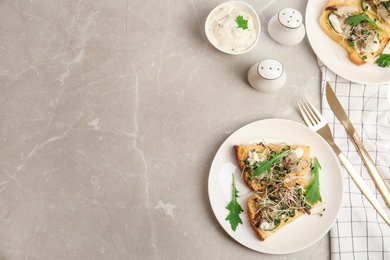 Delicious bruschettas with fish on marble table, flat lay. Space for text