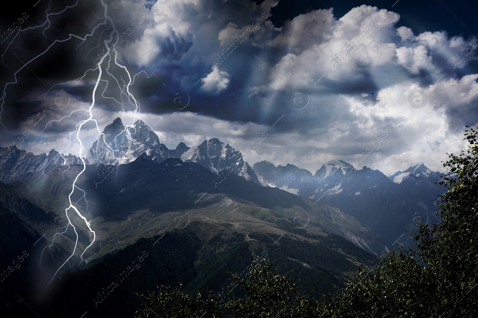 Image of Thunder cloud with lightnings over mountains. Severe weather