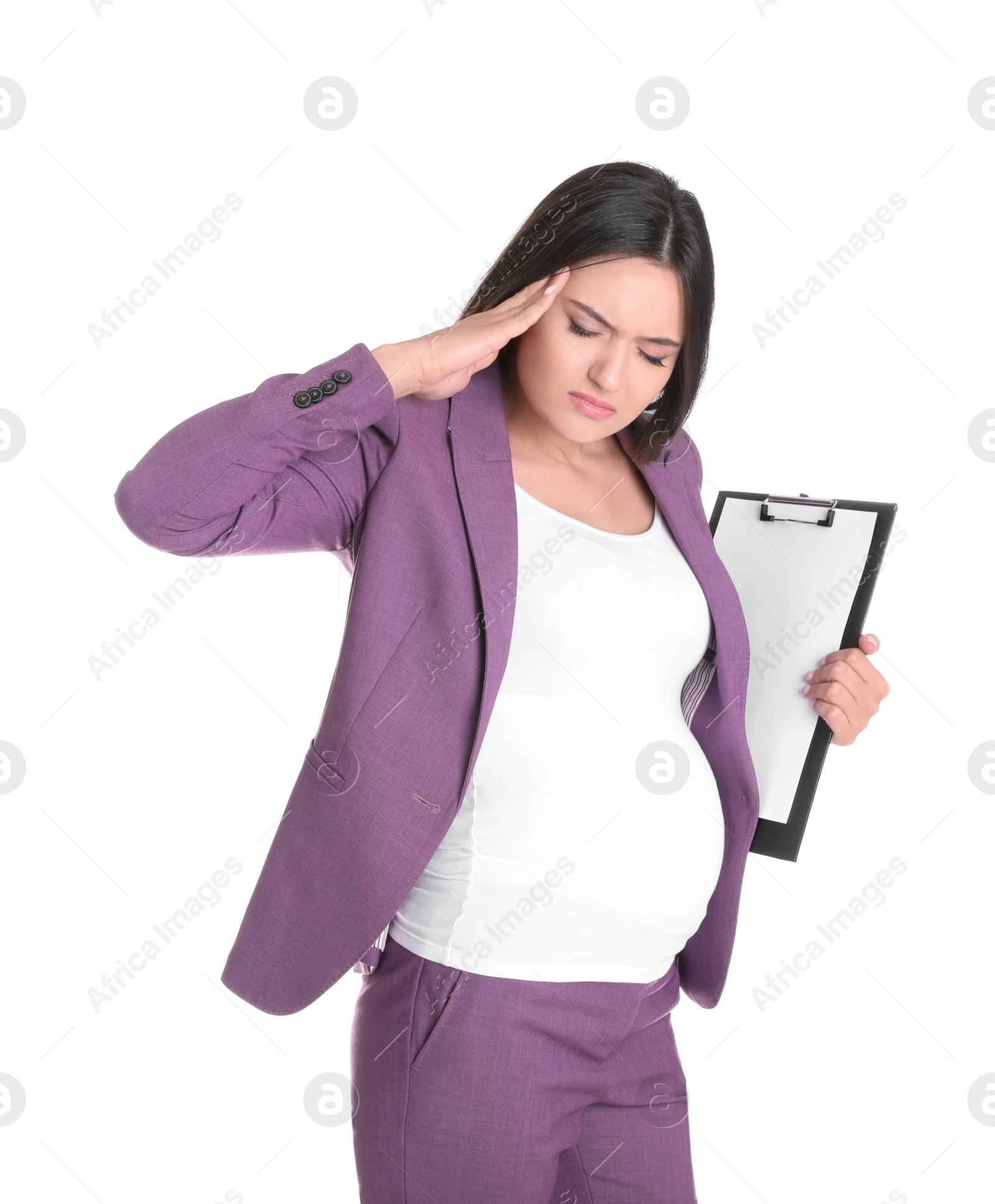 Photo of Young pregnant woman suffering from pain on white background. Working while expecting baby