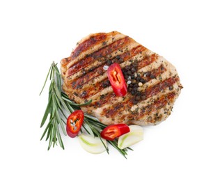 Delicious grilled pork steak and spices on white background, top view