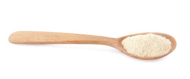 Photo of Wooden spoon with quinoa flour on white background