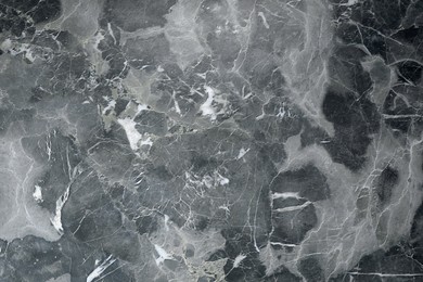 Texture of grey marble stone surface as background, closeup