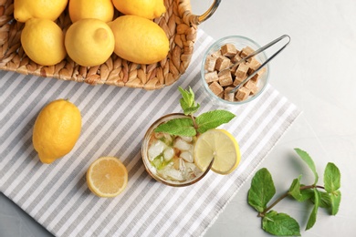 Flat lay composition with mint julep cocktail on table