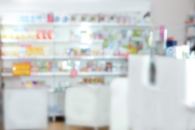 Image of Pharmacy interior with different pharmaceuticals, blurred view