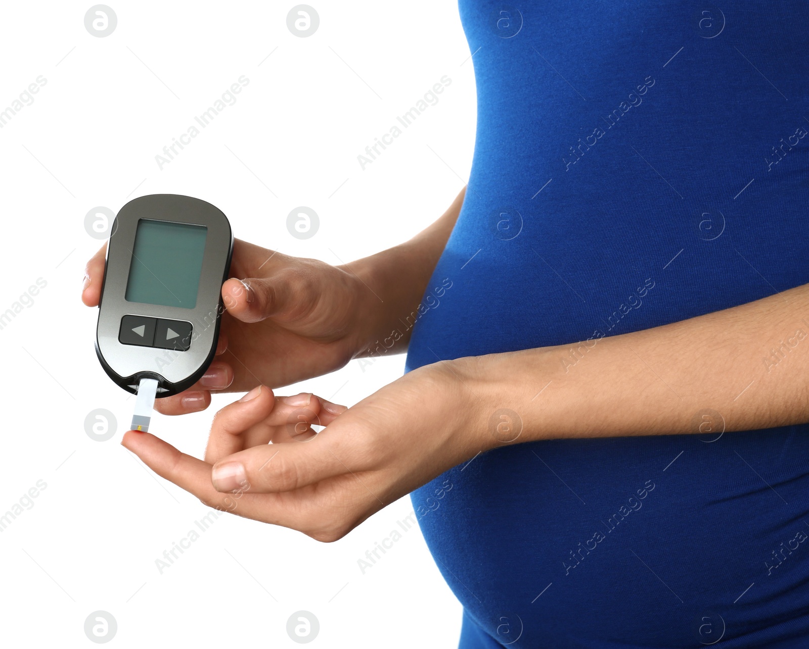 Photo of Pregnant woman checking blood sugar level with glucometer on white background. Diabetes test