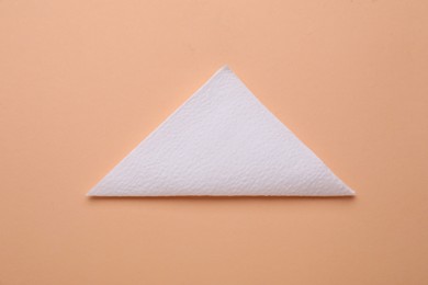 Photo of Clean paper tissue on beige background, top view