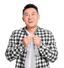 Happy asian man with bubble wrap on white background