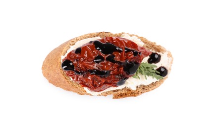 Delicious bruschetta with sun-dried tomato, cream cheese and balsamic vinegar isolated on white, top view