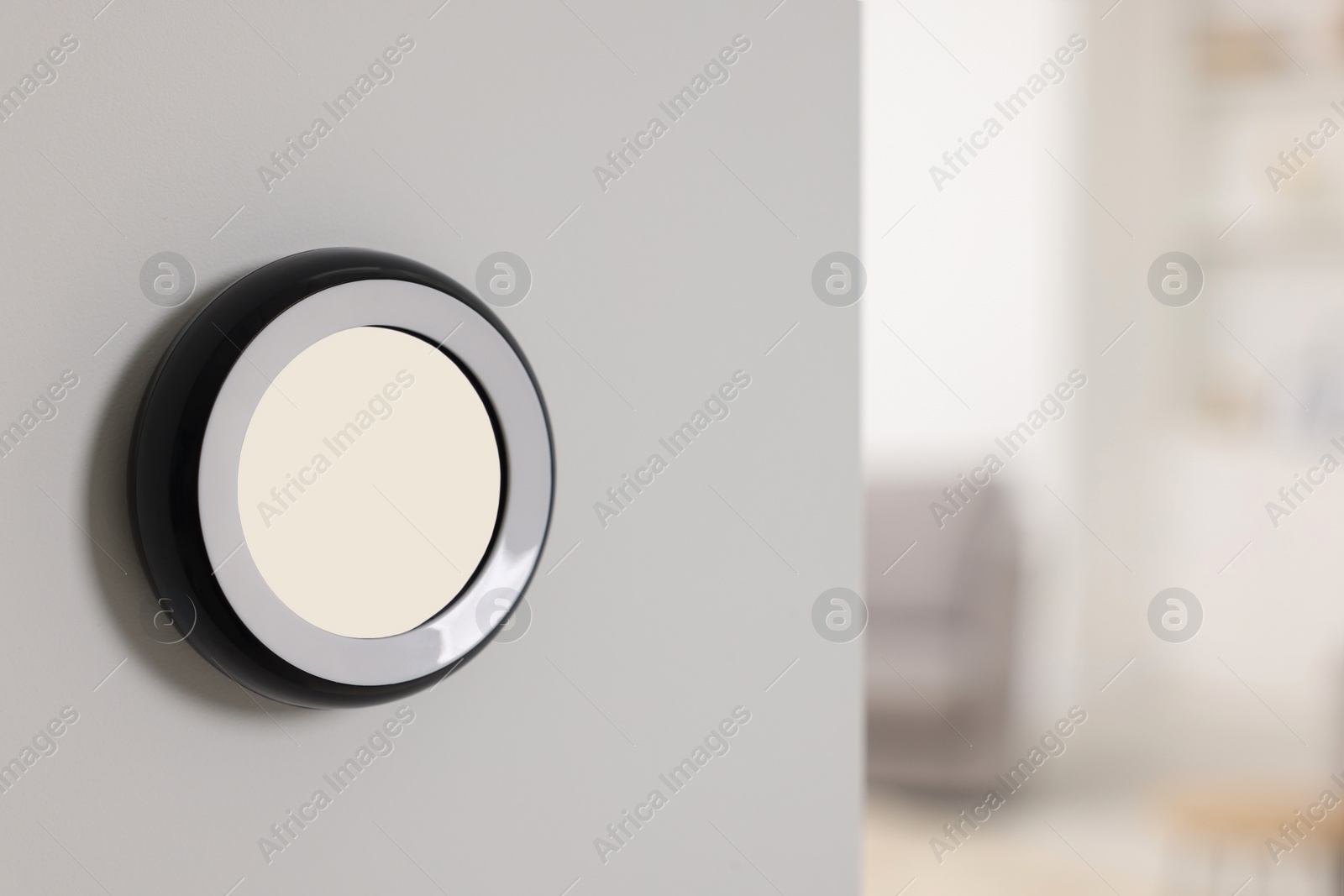 Photo of One thermostat on white wall indoors, space for text. Smart home system