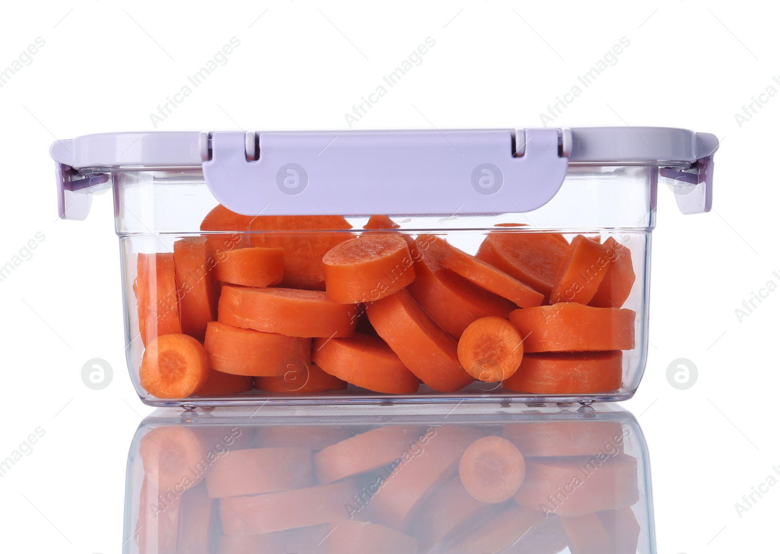 Photo of Box with cut fresh raw carrots on white background