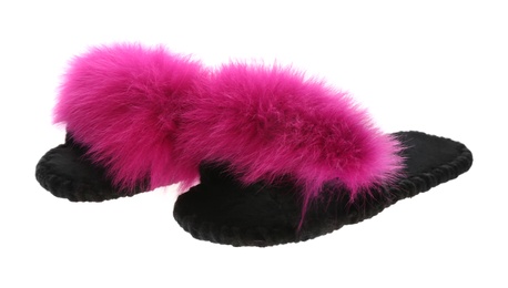 Photo of Pair of soft open toe slippers with pink fur on white background