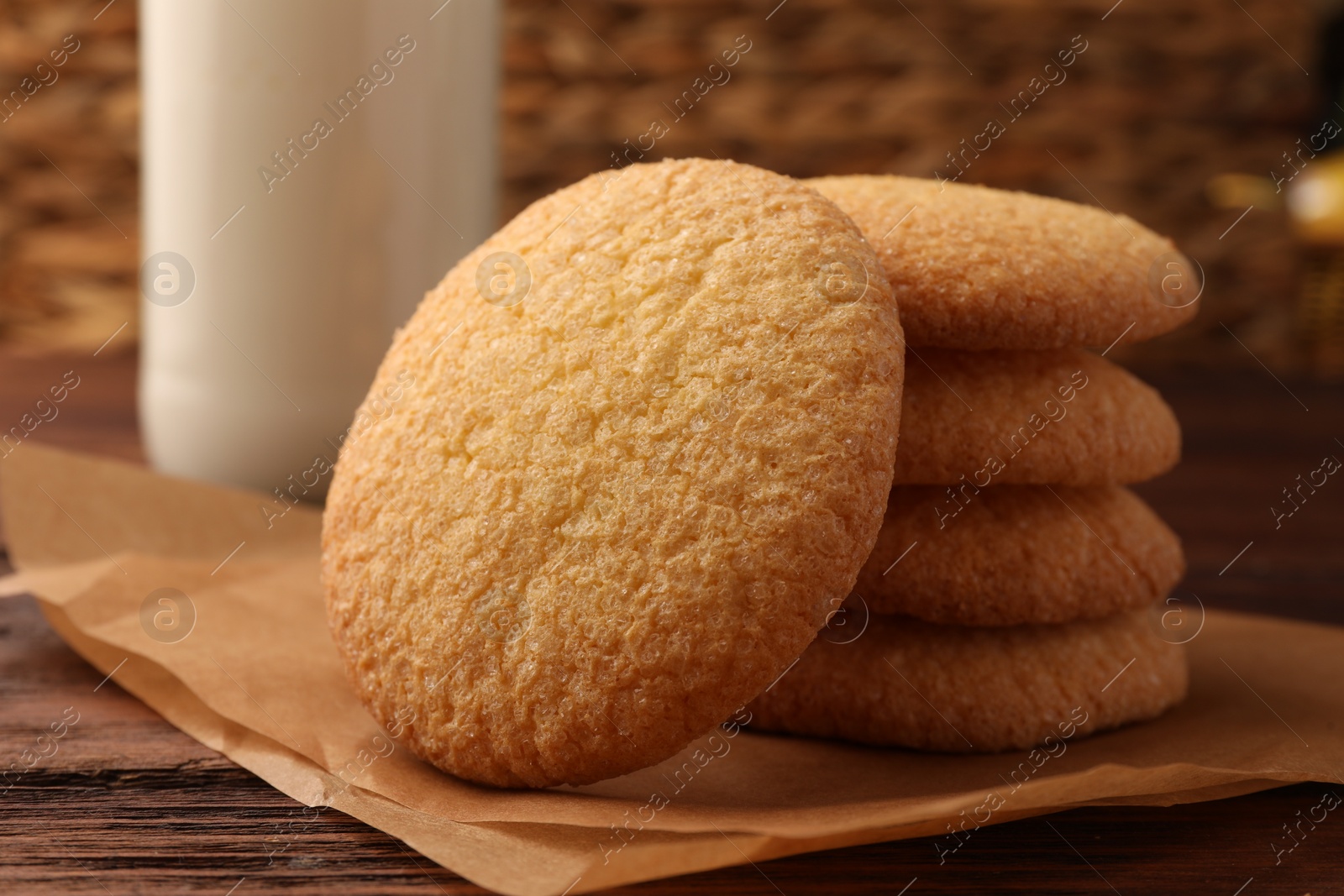 Photo of Delicious Danish butter cookies on wooden table, closeup