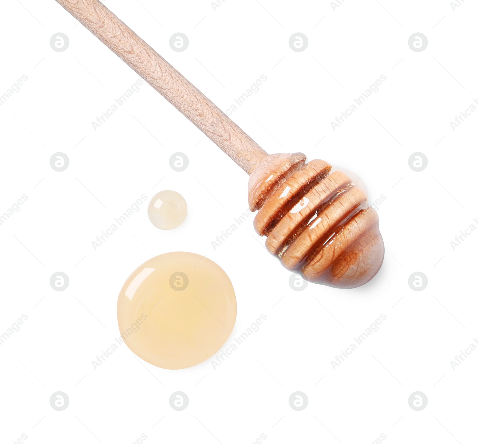 Photo of Tasty natural honey and dipper on white background, top view