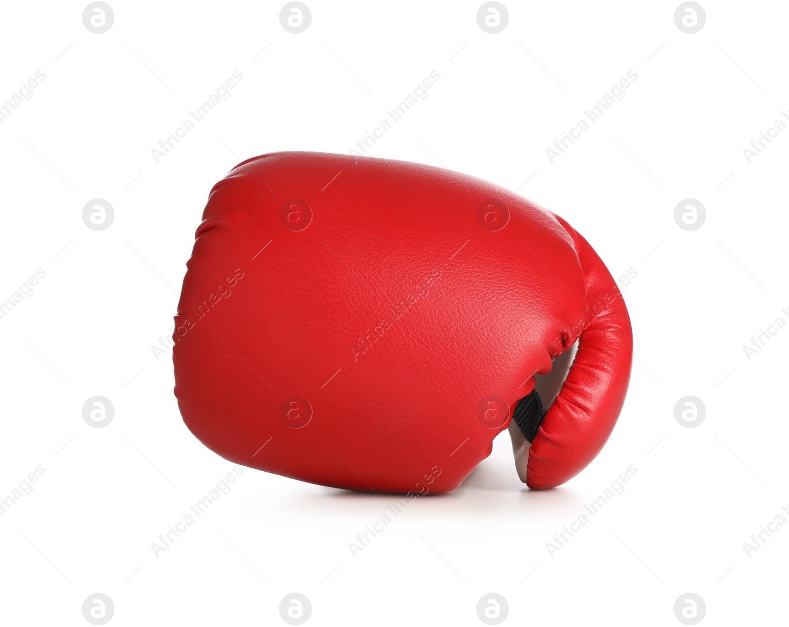 Photo of New red boxing glove isolated on white