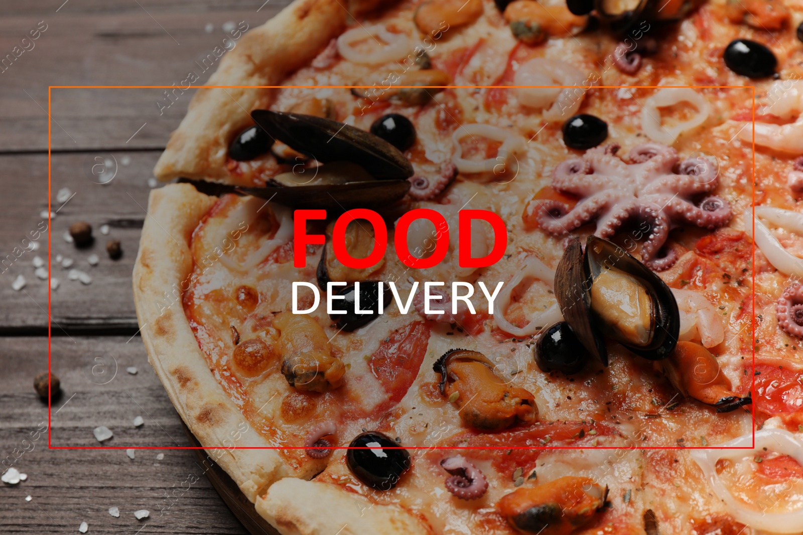 Image of Tasty pizza with seafood on wooden table, closeup. Food delivery service