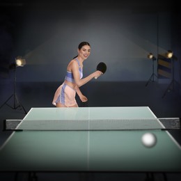 Image of Beautiful young woman playing ping pong indoors