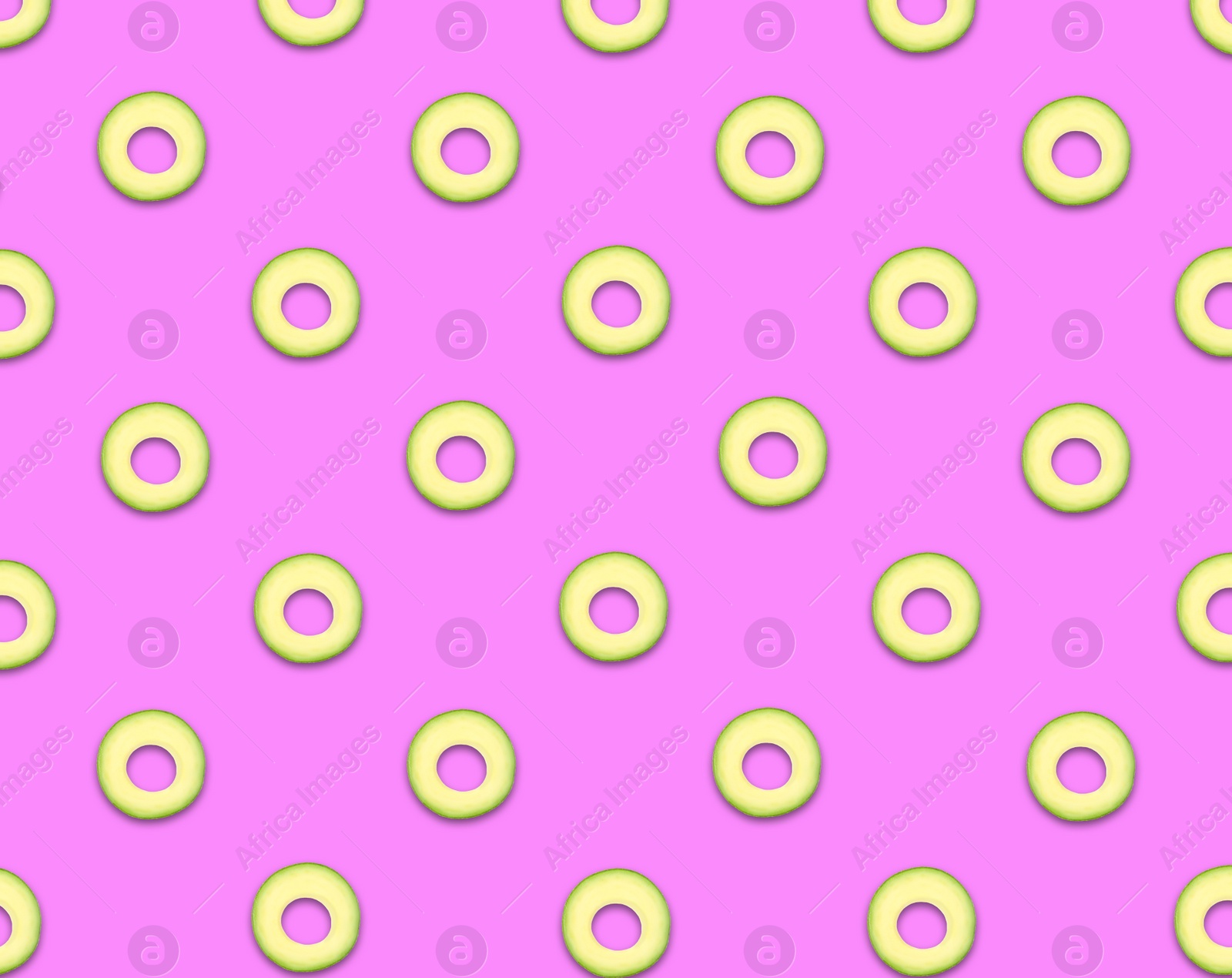 Image of Pattern of avocado slices on pale fuchsia background