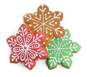 Tasty Christmas cookies in shape of snowflakes isolated on white, top view