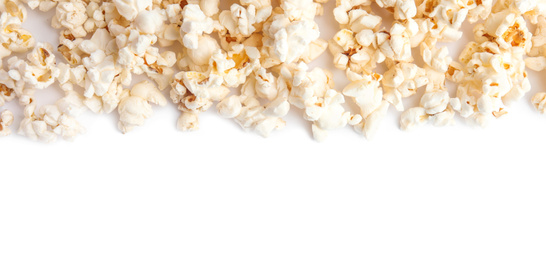 Photo of Tasty fresh pop corn isolated on white, top view