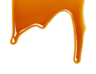 Photo of Delicious caramel sauce on white background