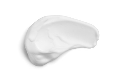 Photo of Smear of shaving foam isolated on white, top view