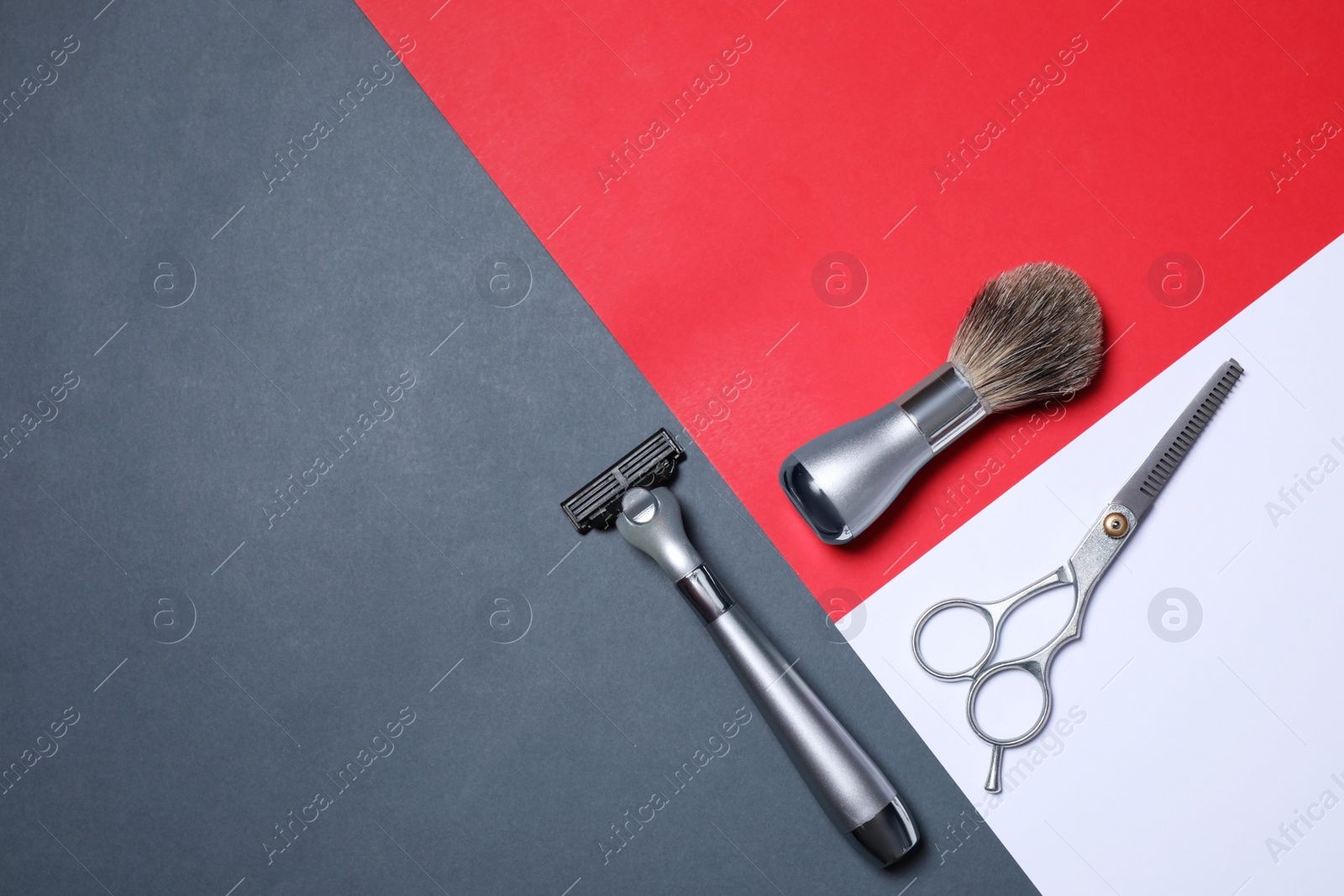 Photo of Set of shaving tools on color background, flat lay. Space for text