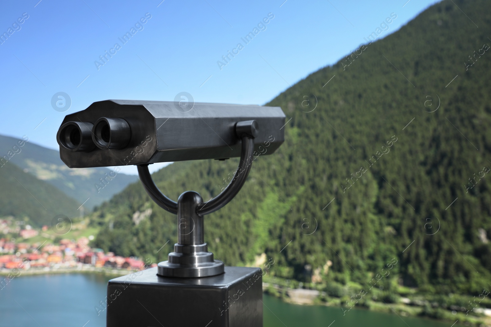 Photo of Observation viewer in mountains outdoors. Space for text