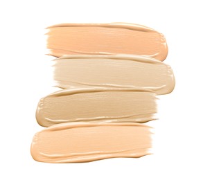 Image of Foundation of various shades for different skin tones isolated on white, top view. Set of samples