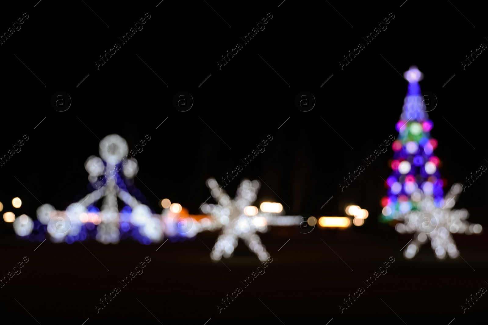 Photo of Beautiful street lights at night. Bokeh effect