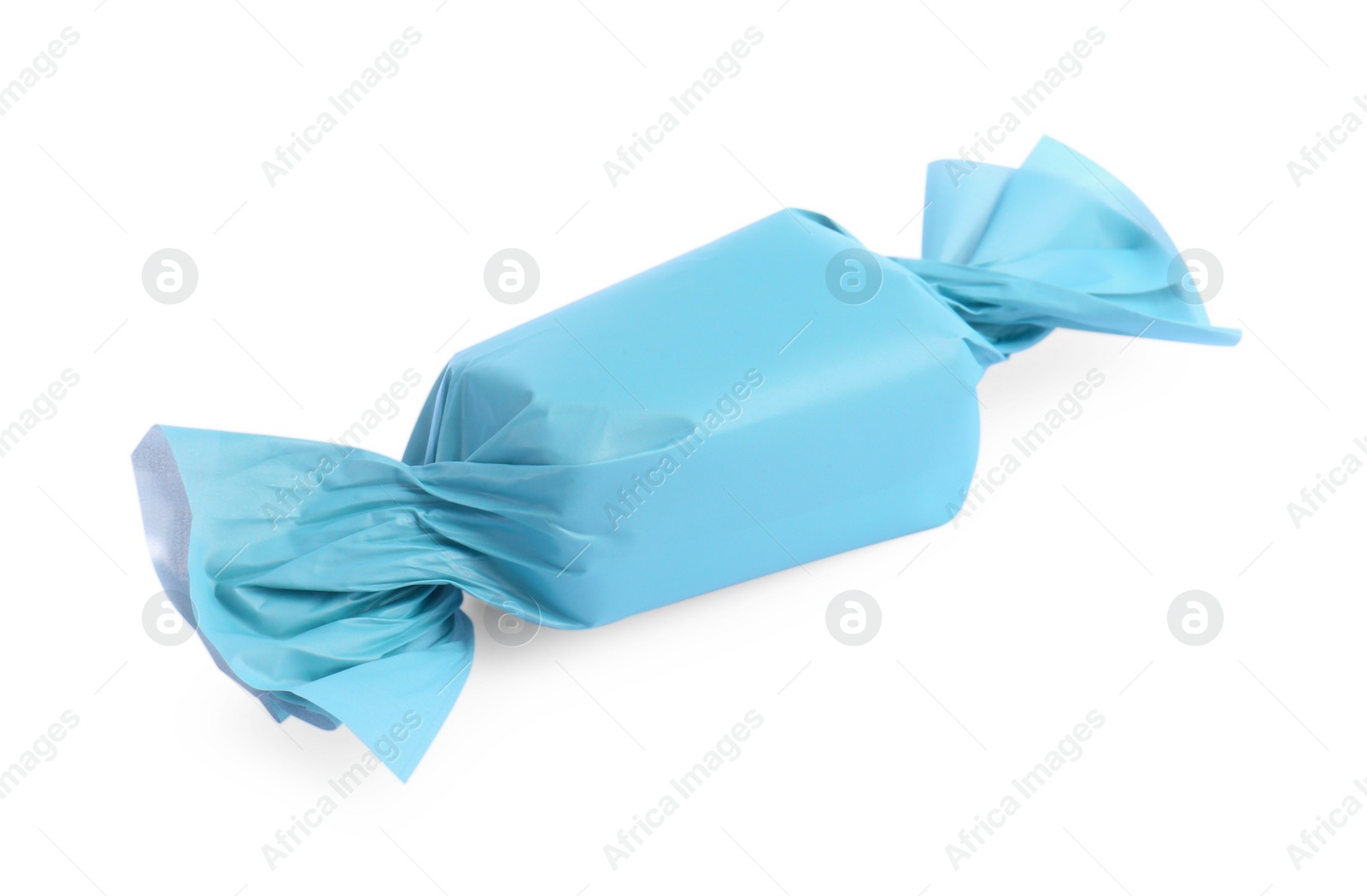 Photo of Tasty candy in light blue wrapper isolated on white