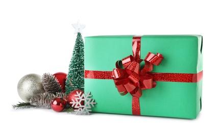 Photo of Christmas gift box with decoration on white background