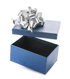 Photo of Open empty gift box with bow on white background