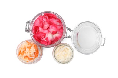 Photo of Delicious sauerkraut prepared according to different recipes on white background, top view