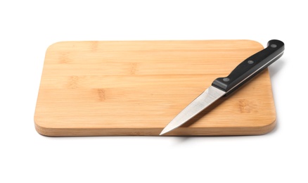 Photo of Paring knife and wooden board isolated on white