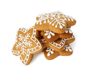 Photo of Tasty star shaped Christmas cookies with icing isolated on white