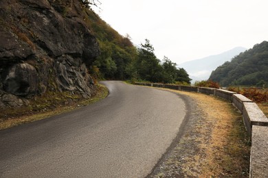 Photo of Beautiful view on empty asphalt road in mountains