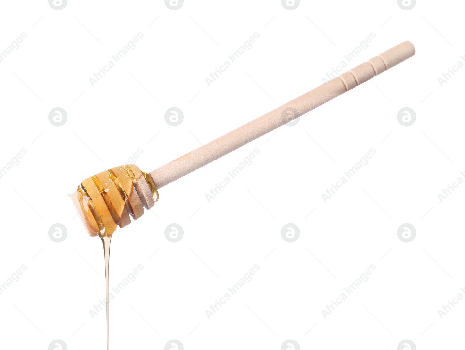 Photo of Fresh honey dripping from dipper on white background