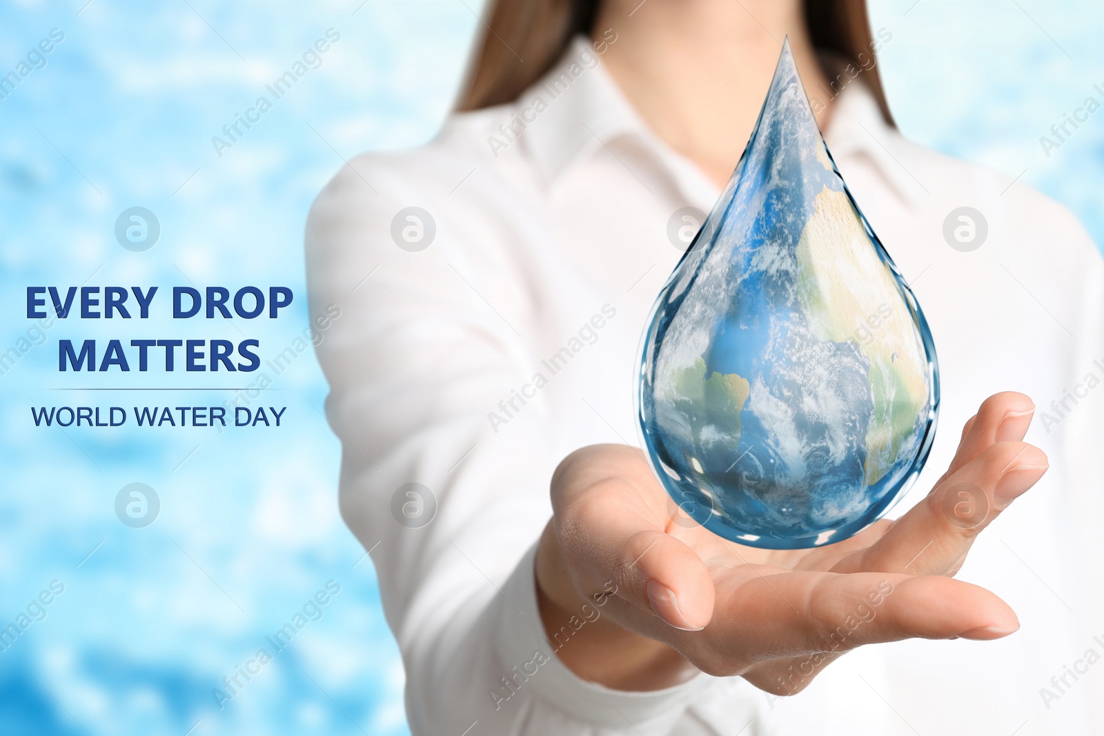 Image of World Water Day. Woman holding icon of drop with Earth image inside on blurred background, closeup