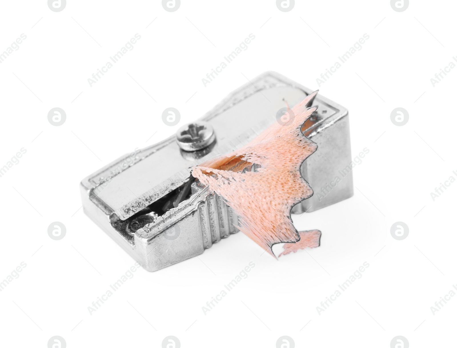 Photo of Metal sharpener with pencil shavings on white background