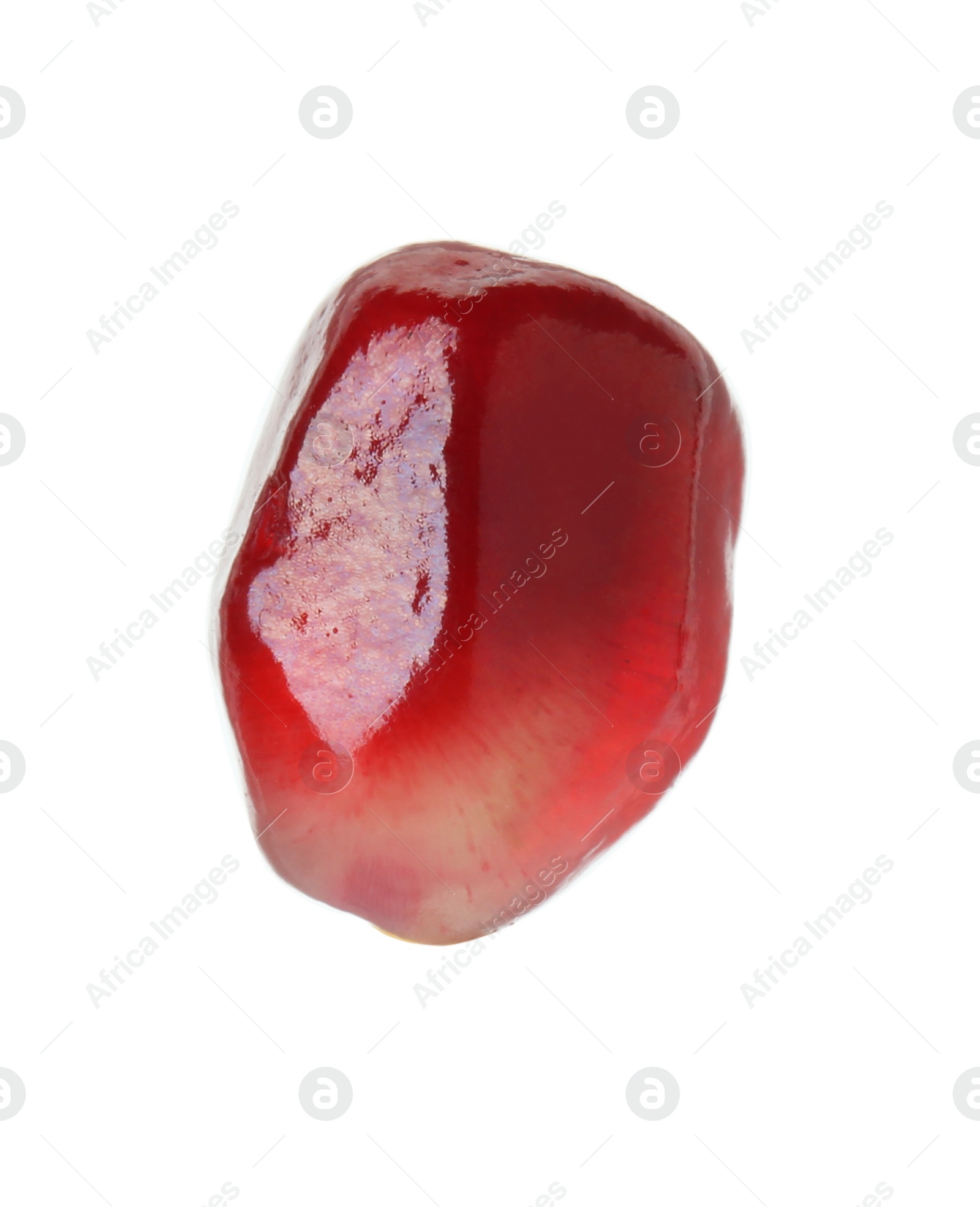 Photo of One ripe pomegranate grain isolated on white