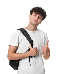 Photo of Handsome young man with backpack showing thumb up on white background