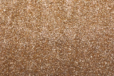 Image of Shiny light brown glitter as background, closeup