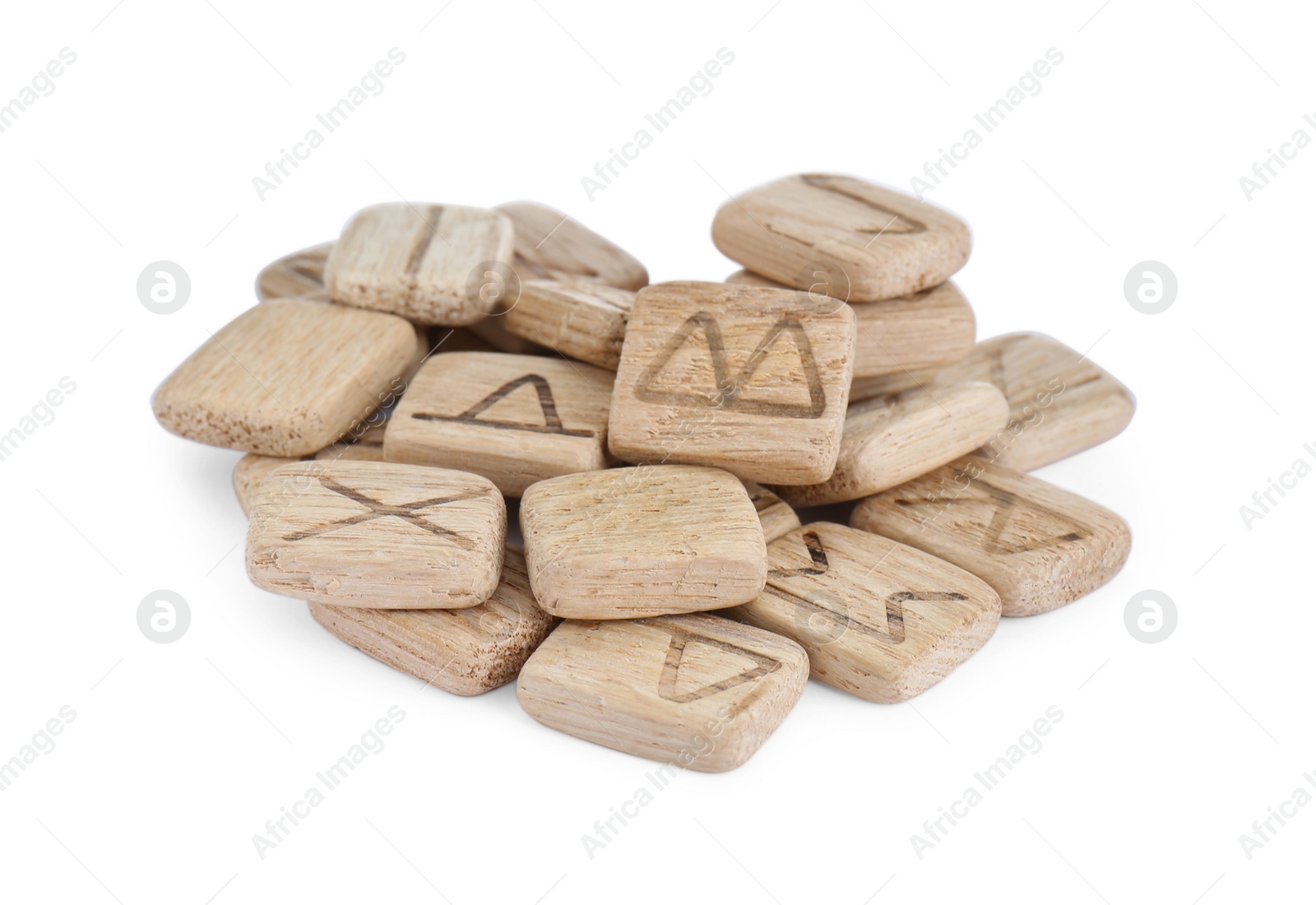 Photo of Pile of wooden runes isolated on white