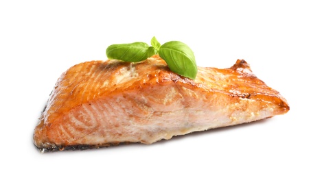 Tasty freshly cooked salmon on white background