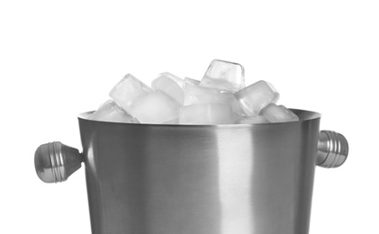 Metal bucket with ice cubes on white background