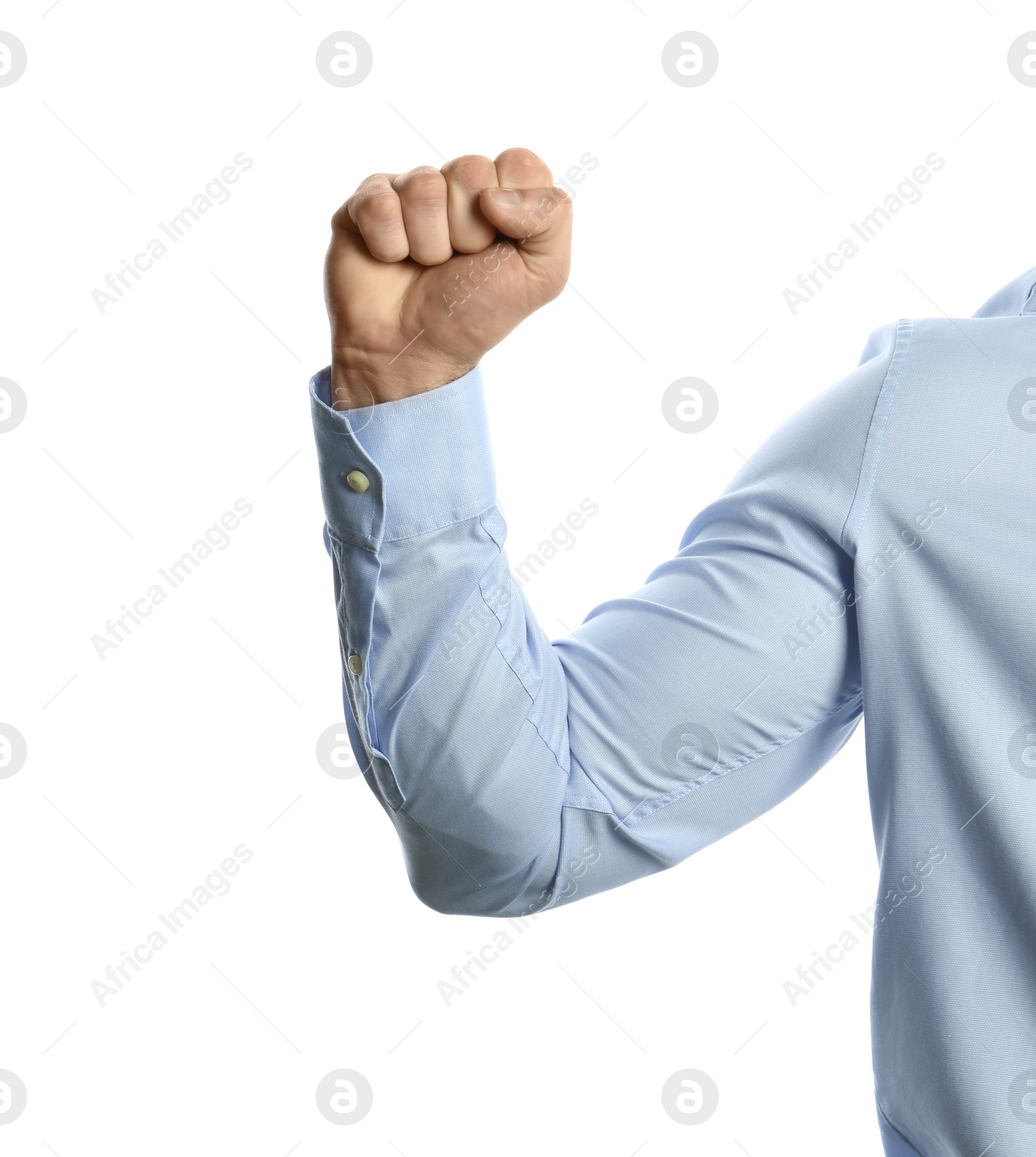 Photo of Young man showing clenched fist on white background