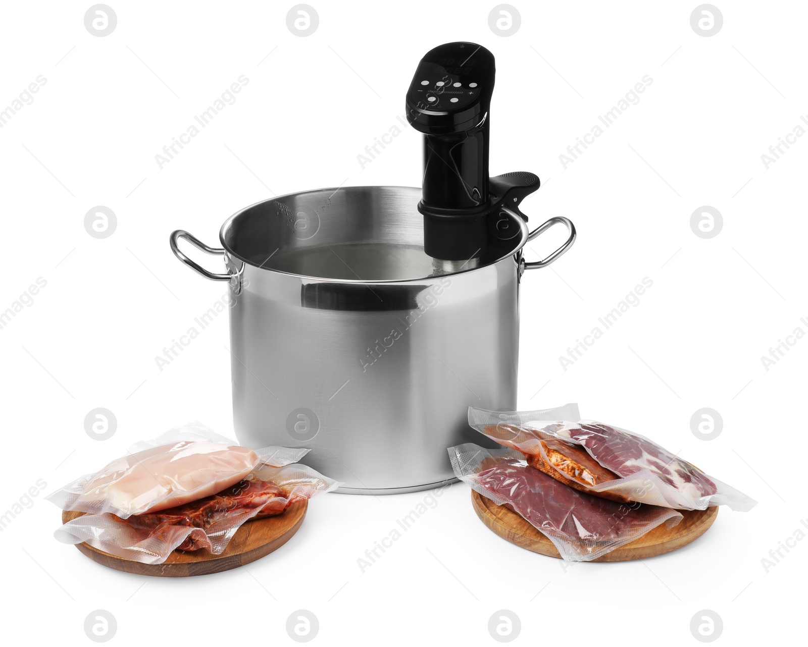 Photo of Thermal immersion circulator in pot and meat on white background. Vacuum packing for sous vide cooking