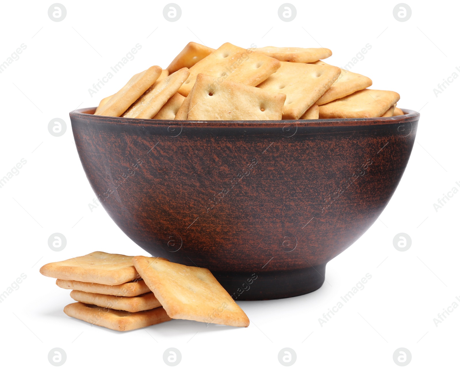 Photo of Tasty crackers in bowl isolated on white