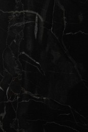 Photo of Black marble surface as background, closeup view