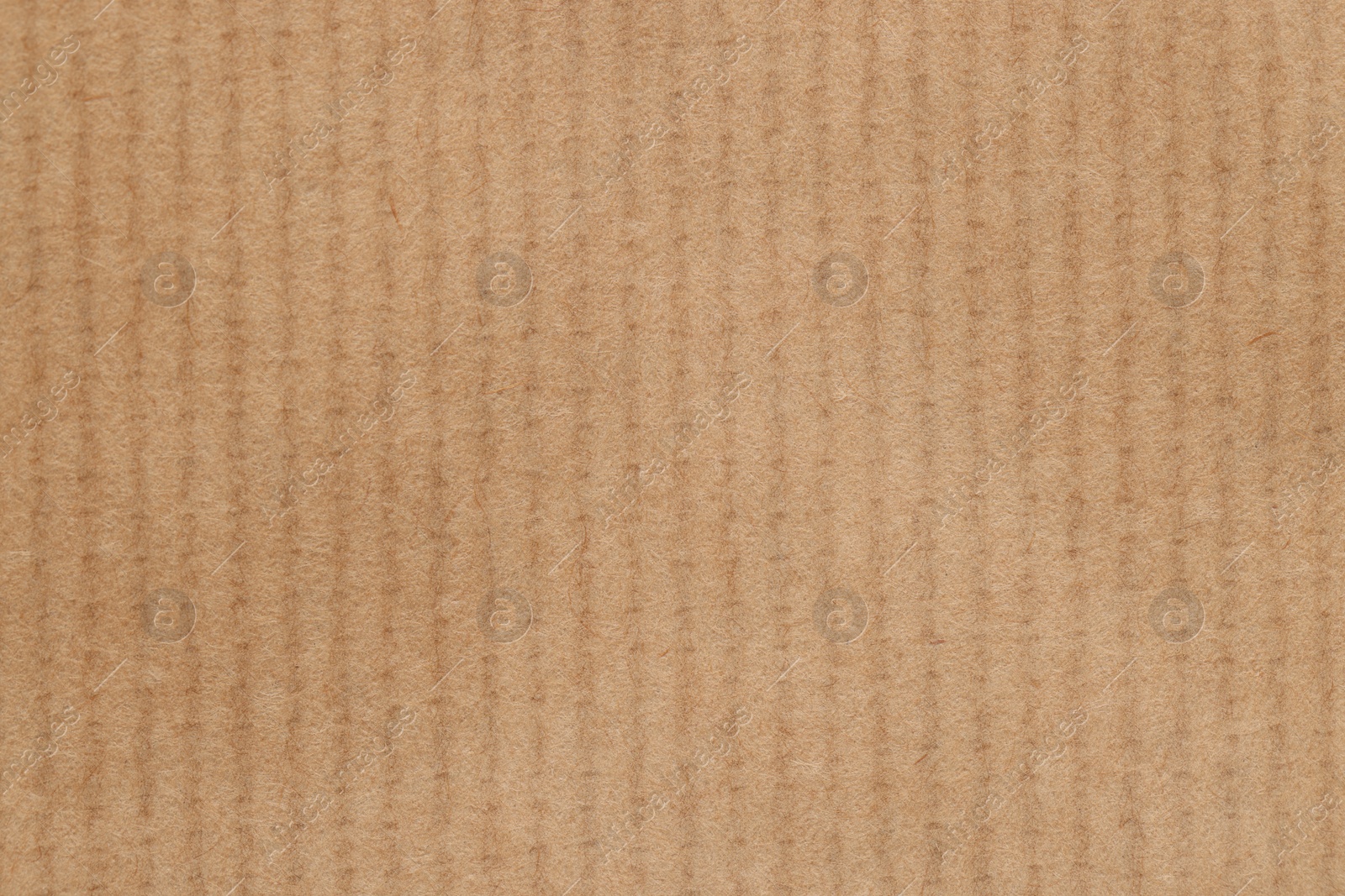 Photo of Texture of beige paper sheet as background, top view